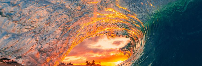 wave breaking on beach photo